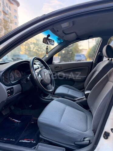 Nissan Sunny 2011, 220,000 km - 1.6 л - Bakı