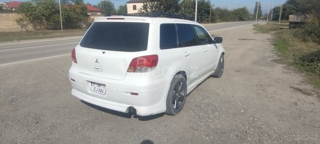 Mitsubishi Airtrek 2002, 360,000 km - 2.0 l - Quba