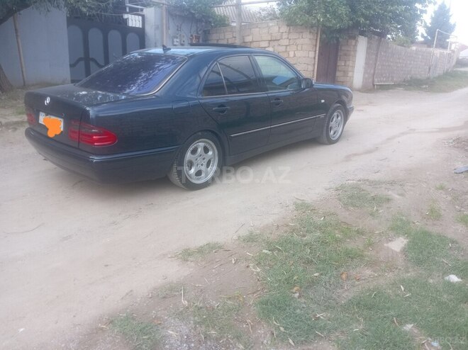 Mercedes E 240 1998, 299,365 km - 2.4 л - Bakı