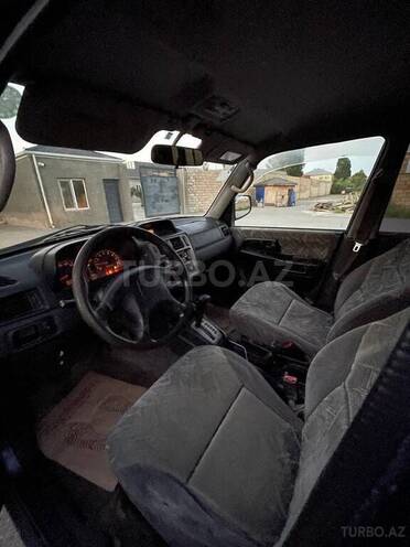 Mitsubishi Pajero io 1999, 224,498 km - 1.8 л - Bakı