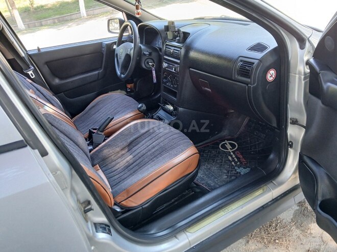 Opel Astra 1999, 446,787 km - 1.6 l - Quba