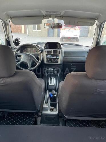 Mitsubishi Pajero io 1999, 250,000 km - 1.8 l - Bakı