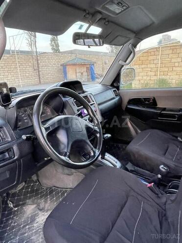 Mitsubishi Pajero io 1999, 250,000 km - 1.8 l - Bakı