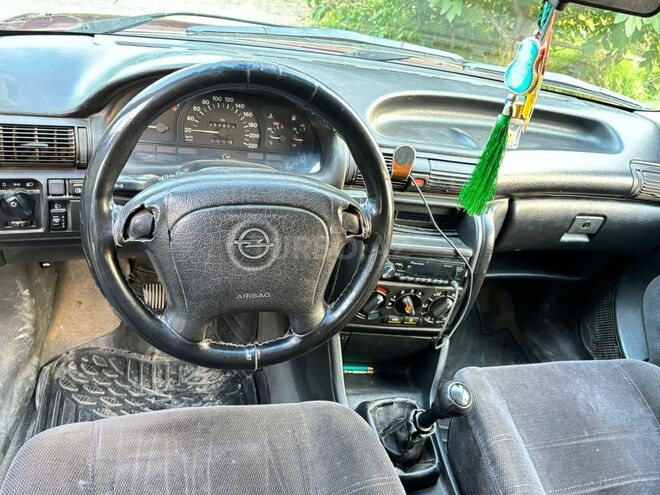 Opel Astra 1994, 123,456 km - 1.6 l - Quba