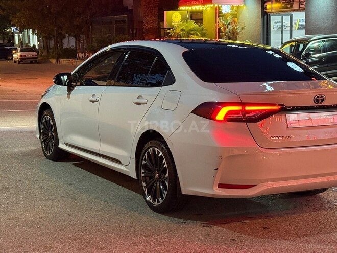 Toyota Corolla 2022, 100,010 km - 1.8 l - Bakı