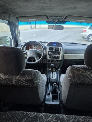 Mitsubishi Pajero io 1999, 420,000 km - 1.8 l - Bakı