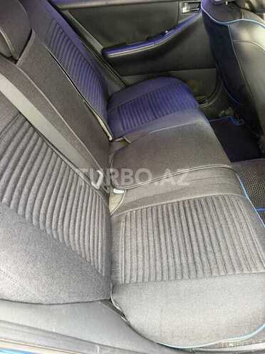 Toyota Corolla 2006, 247,000 km - 1.4 l - Bakı