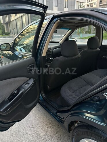Nissan Sunny 2006, 255,000 km - 1.6 l - Bakı
