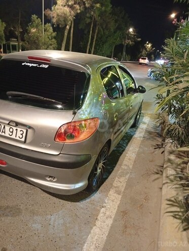 Peugeot 206 2004, 450,000 km - 1.4 л - Şirvan
