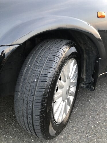 Nissan Sunny 2008, 242,000 km - 1.6 л - Qax