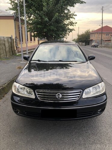 Nissan Sunny 2008, 242,000 km - 1.6 л - Qax
