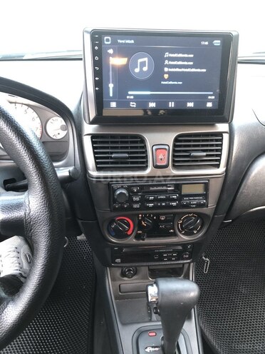 Nissan Sunny 2008, 242,000 km - 1.6 л - Qax