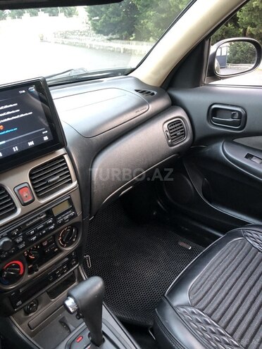 Nissan Sunny 2008, 242,000 km - 1.6 л - Qax