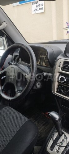 Mitsubishi Pajero io 1999, 280,000 km - 1.8 l - Bakı
