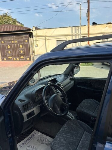Mitsubishi Pajero io 1999, 450,000 km - 1.8 l - Bakı