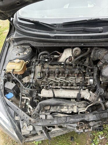 Kia  2010, 245,000 km - 1.6 l - Quba
