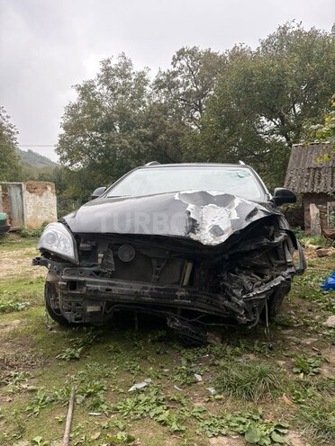 Kia  2010, 245,000 km - 1.6 l - Quba
