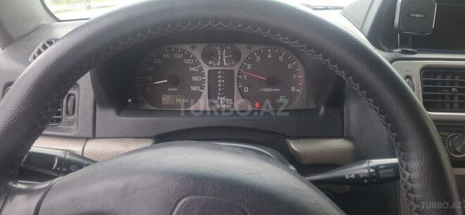 Mitsubishi Pajero io 1999, 412,000 km - 1.8 l - Bakı