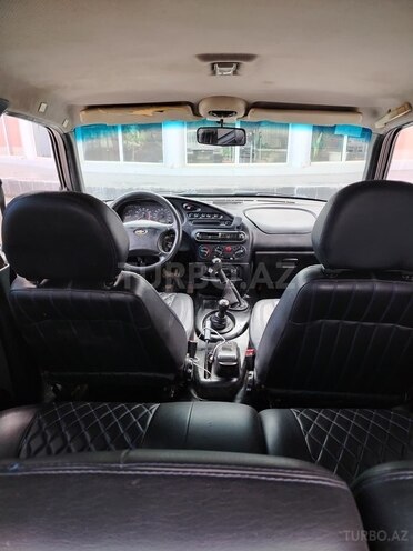 Chevrolet Niva 2004, 338,756 km - 1.7 l - Qazax