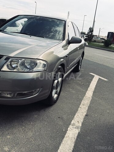 Nissan Sunny 2009, 296,000 km - 1.6 l - Bakı