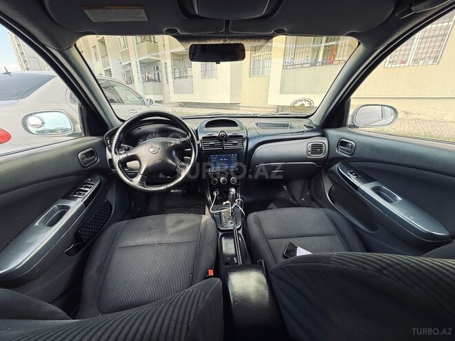 Nissan Sunny 2009, 296,000 km - 1.6 l - Bakı