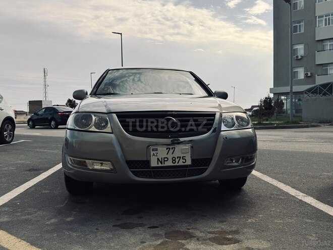 Nissan Sunny 2009, 296,000 km - 1.6 l - Bakı