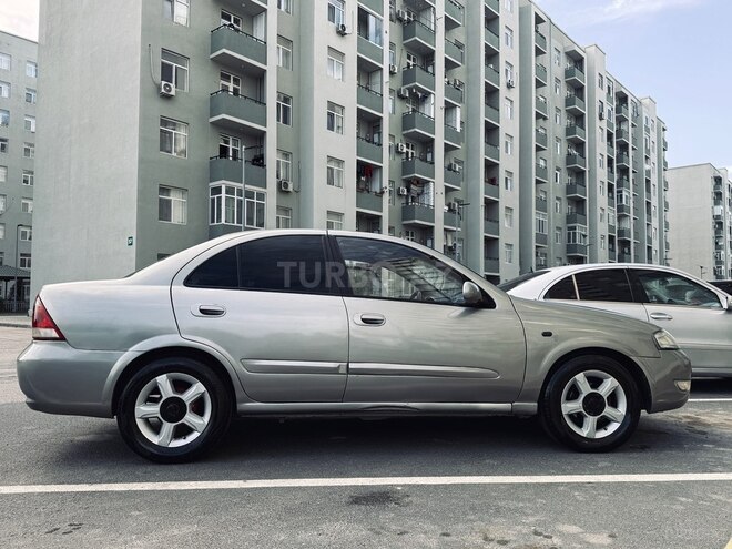 Nissan Sunny 2009, 296,000 km - 1.6 l - Bakı
