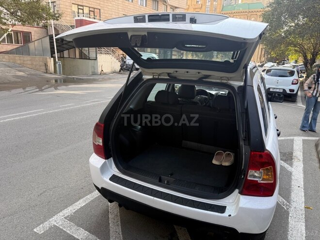 Kia Sportage 2009, 282,000 km - 2.0 l - Bakı