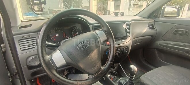 Kia Rio 2009, 248,390 km - 1.4 l - Qax
