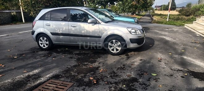 Kia Rio 2009, 248,390 km - 1.4 l - Qax
