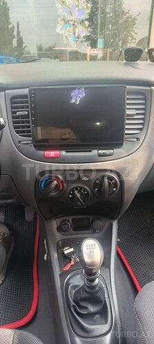 Kia Rio 2009, 248,390 km - 1.4 l - Qax