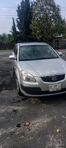 Kia Rio 2009, 248,390 km - 1.4 l - Qax