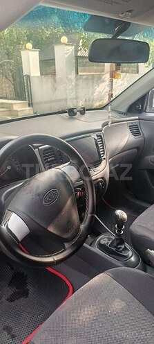 Kia Rio 2009, 248,390 km - 1.4 l - Qax