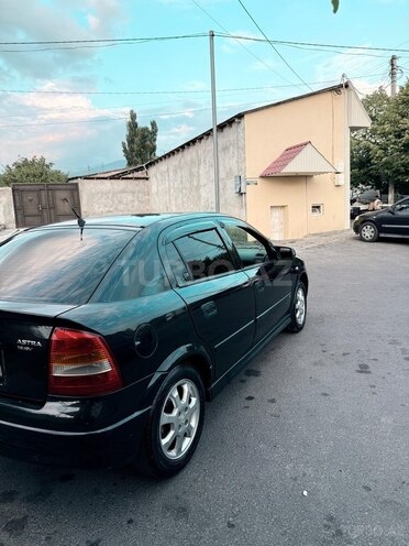 Opel Astra 1999, 295,000 km - 1.6 л - Qax