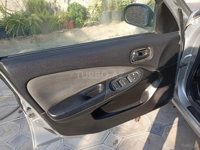 Nissan Sunny 2004, 425,562 km - 1.3 l - Bakı