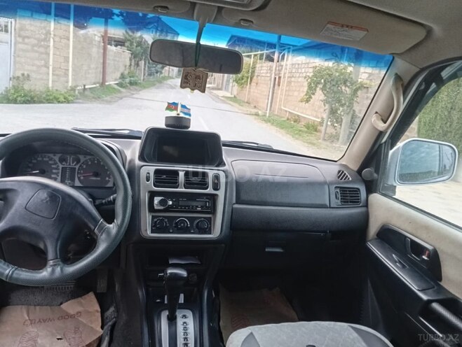 Mitsubishi Pajero io 2002, 243,000 km - 2.0 l - Bakı
