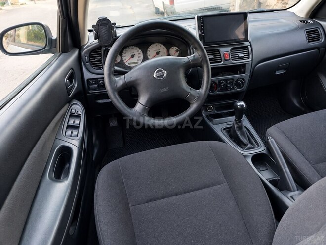 Nissan Sunny 2006, 295,000 km - 1.3 l - Bakı