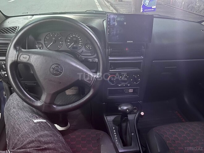 Opel Astra 1999, 320,000 km - 1.6 l - Qax