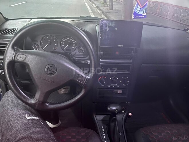 Opel Astra 1999, 320,000 km - 1.6 l - Qax