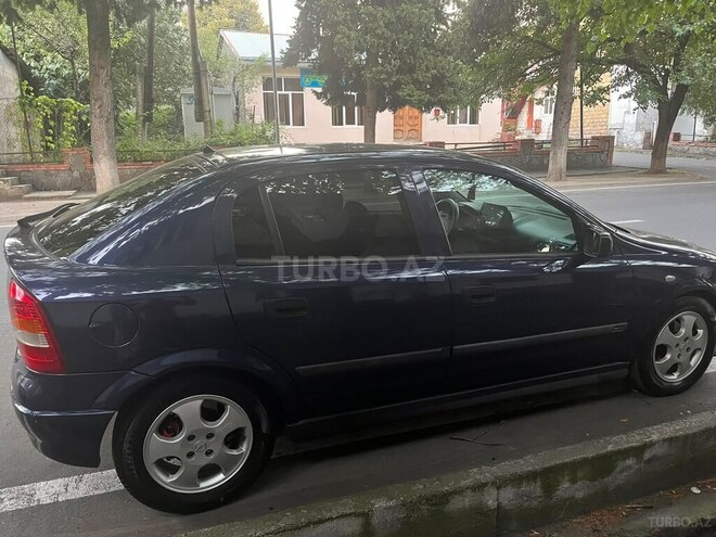Opel Astra 1999, 320,000 km - 1.6 l - Qax