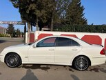 Mercedes E 280-11