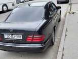 Mercedes E 230-4