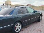Mercedes E 280-10