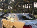 Mercedes E 280-13
