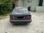 Mercedes E 290-4