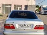 Mercedes E 230-4