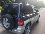 Mitsubishi Pajero io-5