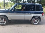 Mitsubishi Pajero io-7