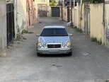 Mercedes E 230-11