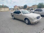 Mercedes E 230-1